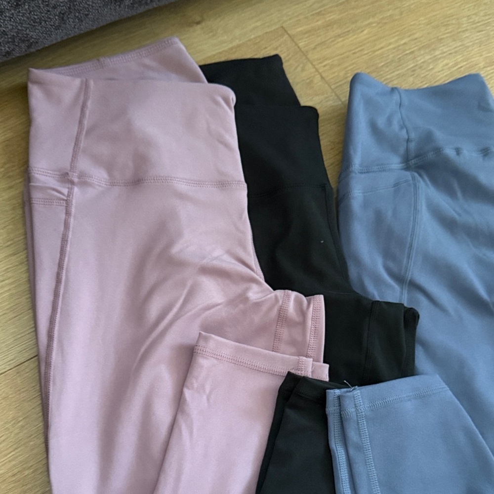 Trendy Pink/Mauve, Black, and Blue Leggings Trio.  Never worn